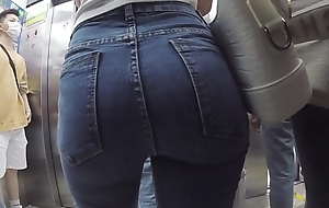 Above-board a slim Asian girl prevalent tight jeans
