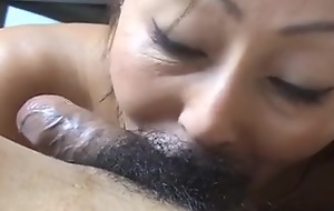 Asian lady is sucking lacking my load of shit