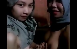 Melayu super hawt licking boobs lesbo tudung