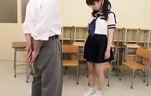Pigtailed Japanese schoolgirl has an experienced man toying her h