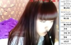 Queasy Korean teen undresses on a webcam