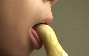 Spectacular Japanese bombshell sexily gnawing away a banana