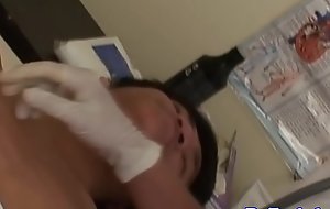 Oriental twink doctor examining pain in the neck