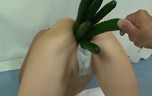 Stuffing her ruined ass with huge fruits and vegetables