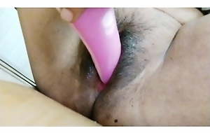 Mallu girl stuffing a massager all round vagina